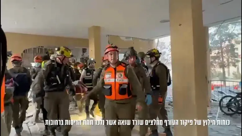 Watch: Holocaust survivor rescued from rubble after Rehovot missile strike