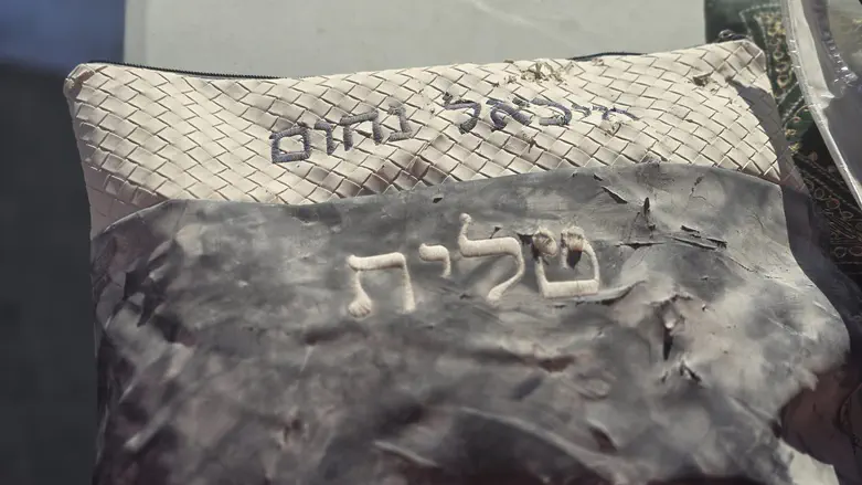 A moment of solace: Miki Nahum’s tefillin found intact in Bat Yam rubble