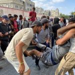 Hamas officials say IDF killed at least 50 people, injured over 200 near aid site