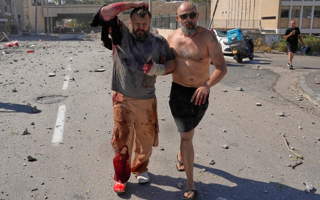 At least 23 wounded by Iranian missile in Haifa; woman dies of heart attack in Karmiel
