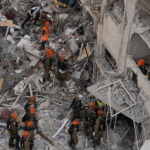 Death toll rises as bodies pulled out of rubble in Bat Yam after missile strike