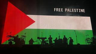 British band Massive Attack screens video of Yahya Sinwar, anti-Israel montage during concert