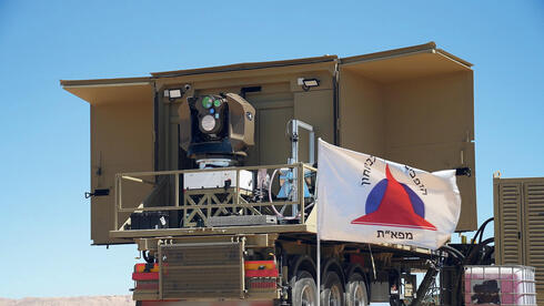 Laser beams and battlefield proof: Israeli arms firms sell their war story in Paris