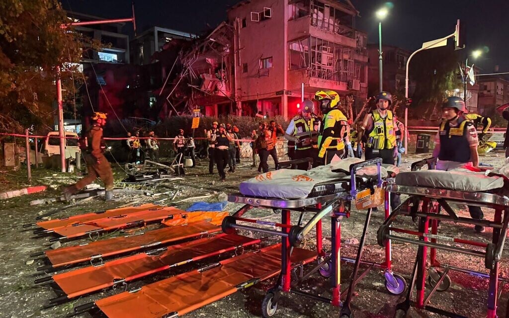 Iran launches barrages of ballistic missiles at Israel; 2 critically hurt as buildings hit