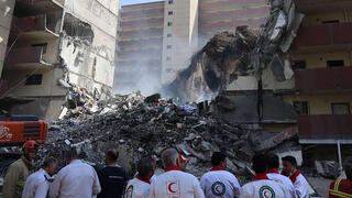 Israeli strikes reportedly trigger air defenses near Iran’s key port and nuclear sites