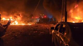 Victims suffocated under burning rubble after Iran missile strike on Haifa, officials say