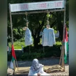 Shock in Sweden: Protestors hang effigies in concentration camp uniforms
