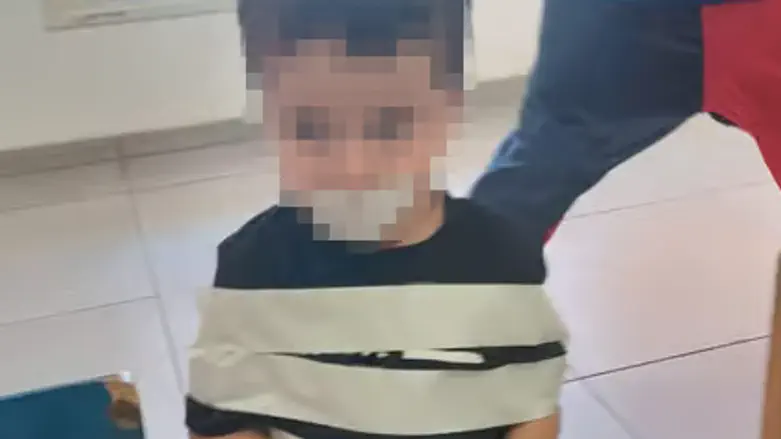 Clown ties child to chair while teacher takes photo