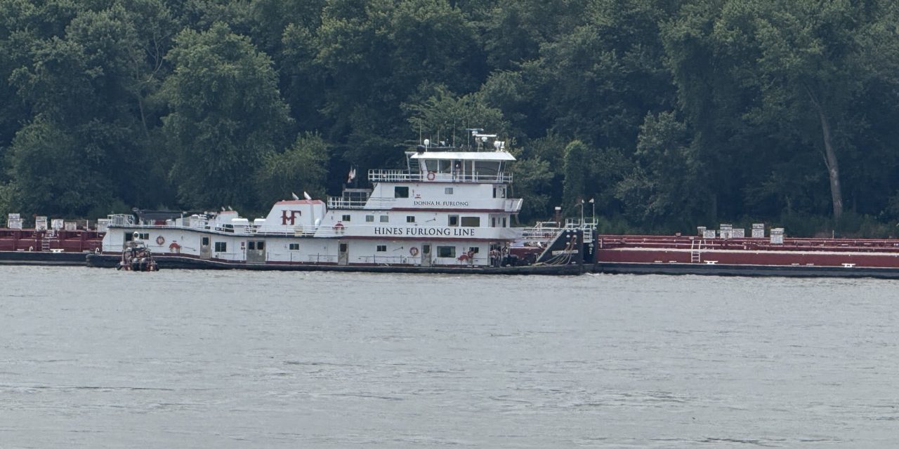 Helicopter crashes into barge, kills two people, shuts Mississippi River, Coast Guard says