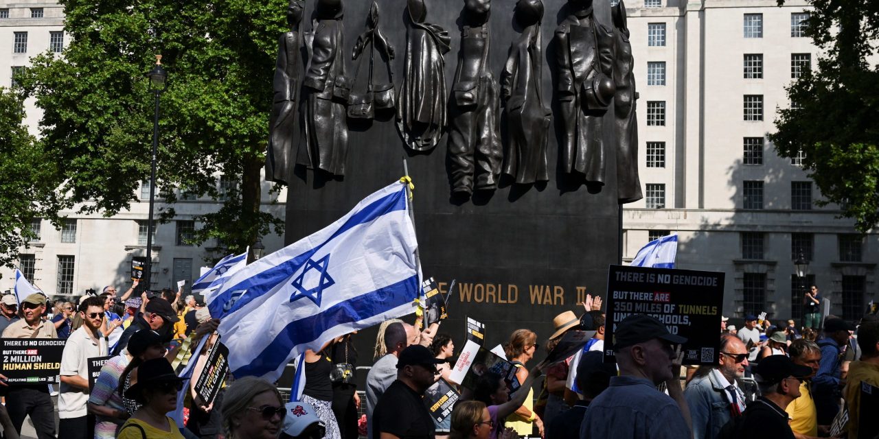 Iranian dissident journalist choked in assault at London march for release of hostages