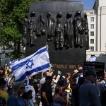 Iranian dissident journalist choked in assault at London march for release of hostages
