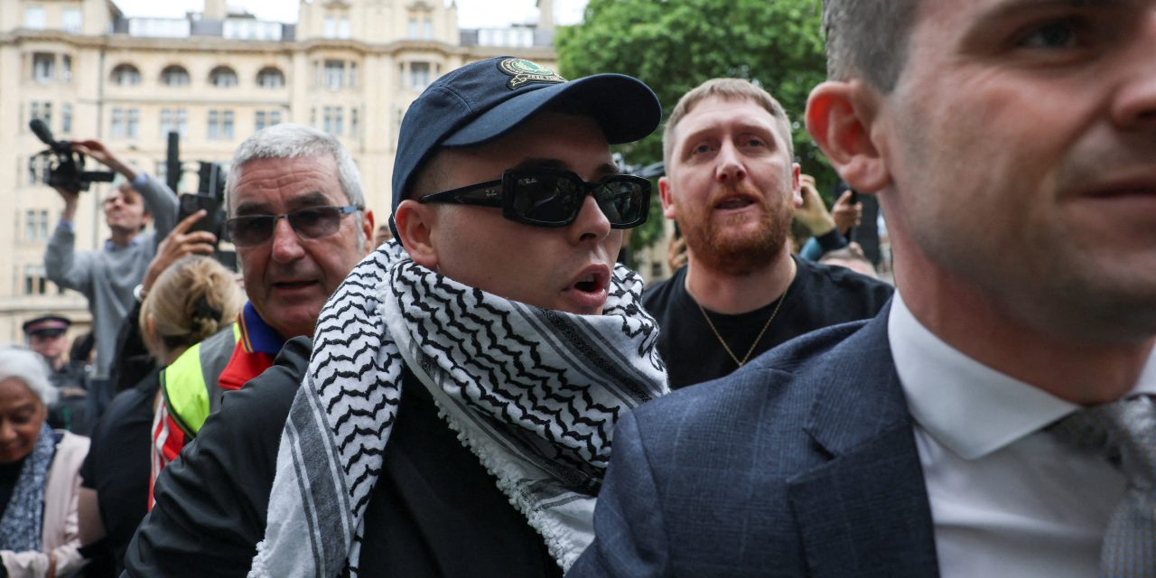 Member of Irish rap group Kneecap appears at UK court on terrorism charge