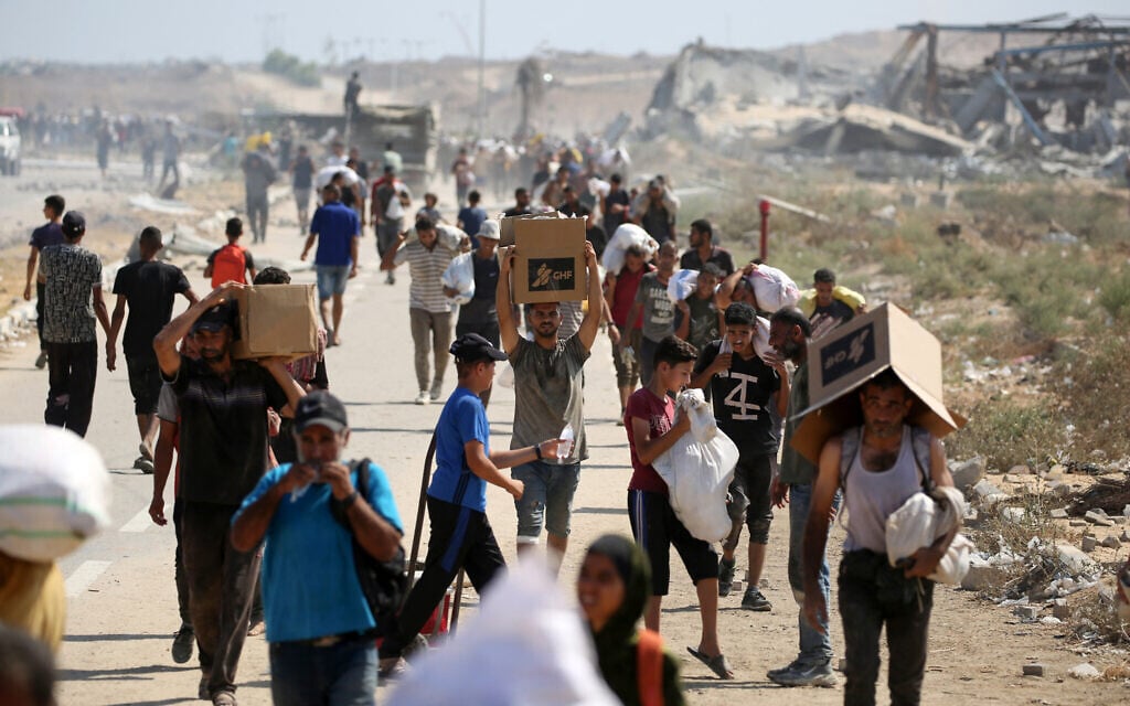 Palestinians report 23 killed near Gaza aid sites, 6 starvation deaths in past day