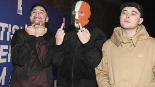 Member of Irish rap group Kneecap appears in UK court for displaying Hezbollah flag