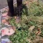 Haifa municipal workers dump garden waste on hostage sign, sparking outrage
