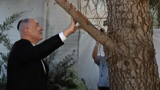 Netanyahu visits Ofra settlement, comes under pressure to apply sovereignty