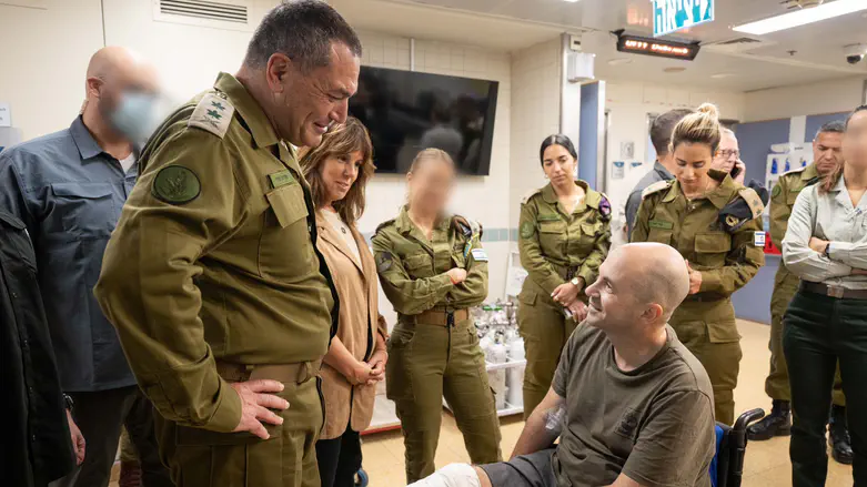 Zamir to wounded troops: ‘We will fight the next battle with you, the battle of recovery’