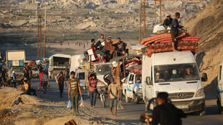 Israel lets Hamas official leave Gaza while group tells civilians not to evacuate