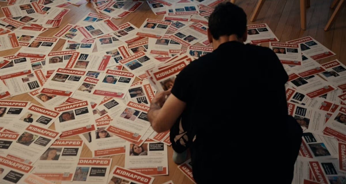 With hostages home, the filmmaker behind ‘Torn’ says his documentary about NYC’s poster wars remains sadly relevant