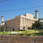 Mixed-gender guard shifts at the Cave of the Patriarchs