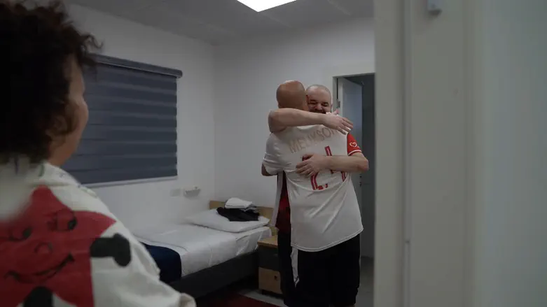 Watch: Freed hostage Eitan Horn reunites with brother Iair