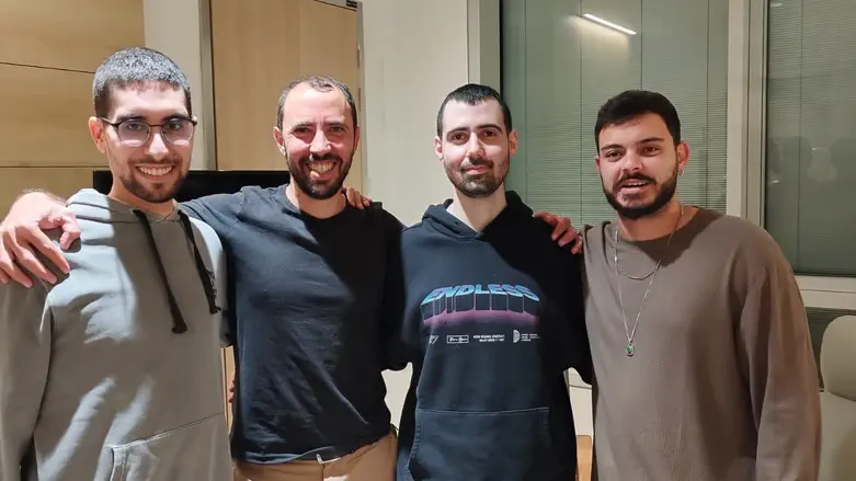 Together again: Released hostages Omer Wenkert and Tal Shoham meet newly-released friends