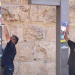 Removal of memorial stickers for fallen soldiers sparks confrontation at Jaffa Gate