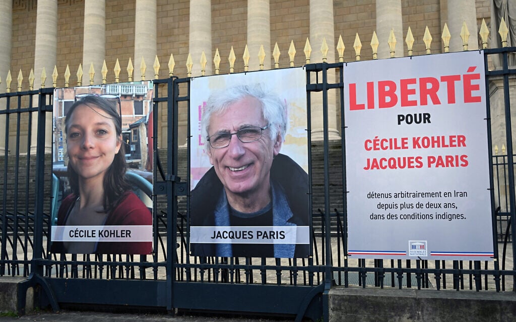 Iran court sentences 2 French citizens to long jail terms for spying for Israel, France