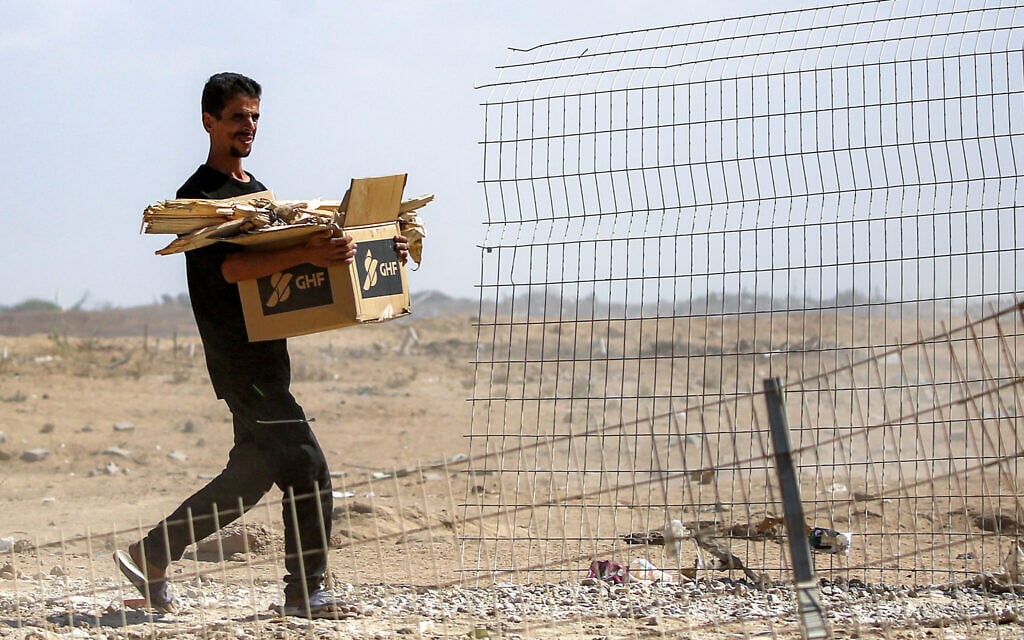 Officials say GHF aid sites being shut down, in accordance with Gaza deal