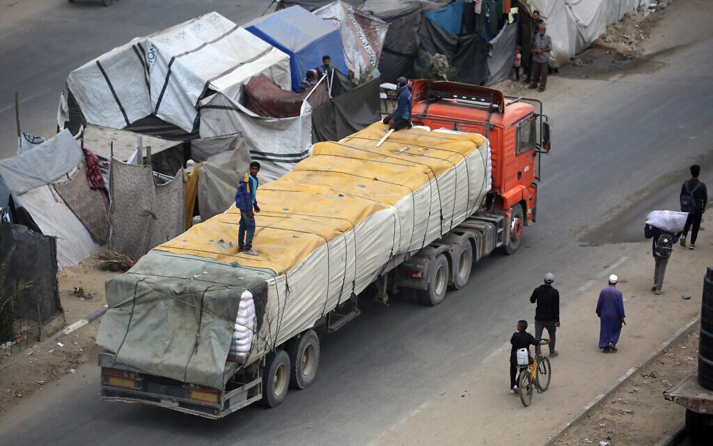 Gaza aid deliveries appear to surge; GHF distribution sites close for hostage release