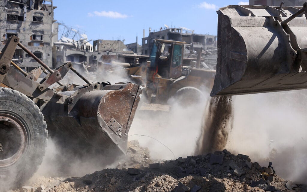 As world powers prepare to rebuild Gaza, IDF said to dump trash across the border