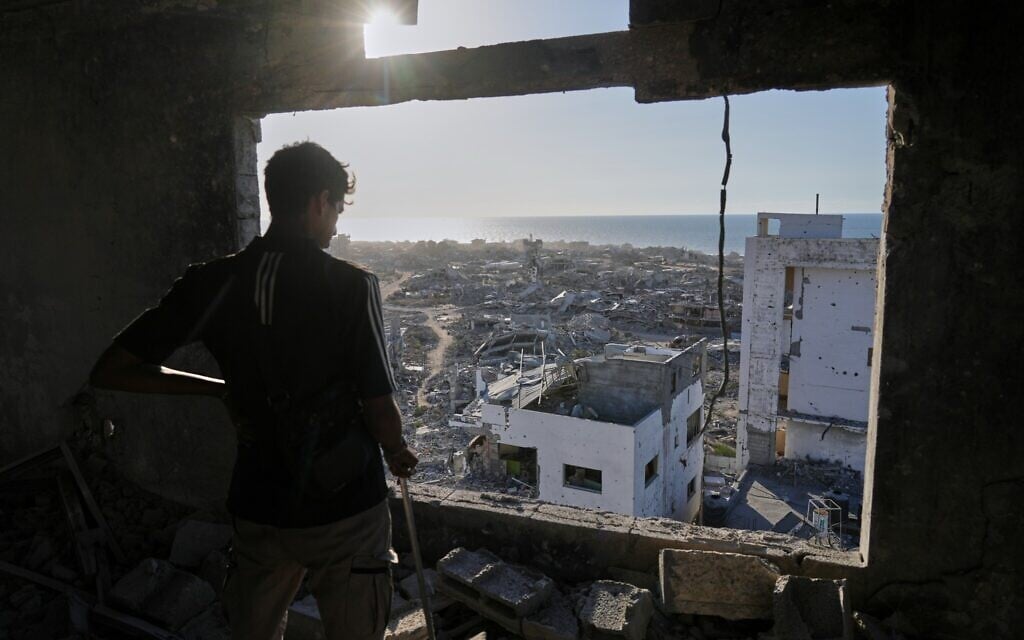 Gazans’ joy over ceasefire tempered by shock as they return to destroyed homes