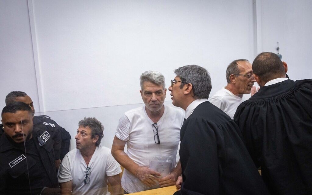 Activists jailed for weeks over dumpster fires near PM’s home freed to house arrest