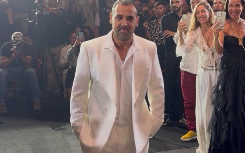 Eli Sharabi, relatives of ex-hostages strut runway at TLV Fashion Week
