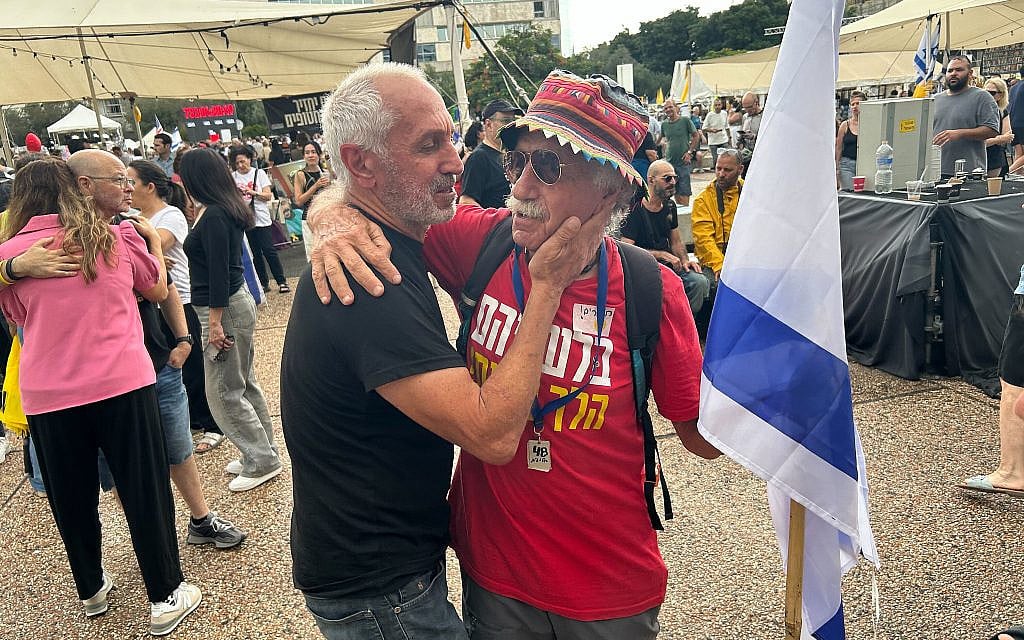 Singing, cheering, anticipation mix at Hostages Square after deal to free captives