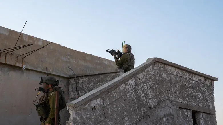 Watch: IDF reserve brigade uncovers weapons cache in southern Syria