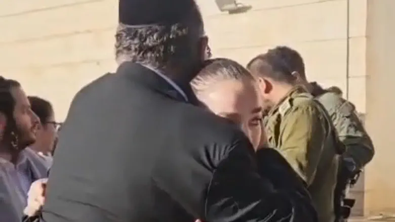 Watch: Hasidic father hugs his daughter as she enlists in Border Police