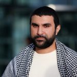 UK pro-Palestinian commentator lands back in Britain after release from US detention