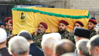 Hezbollah military chief buried in Beirut after Israeli strike as leadership splits over response
