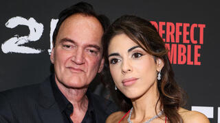 At their peak: Quentin Tarantino and Daniella Pick pour on the love on the red carpet