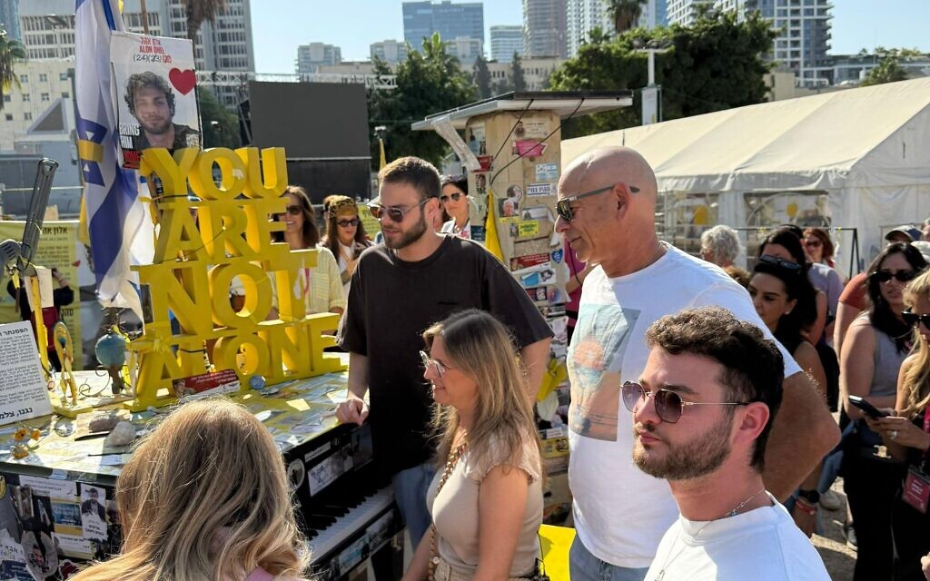 At Hostages Square, Alon Ohel plays piano named for him