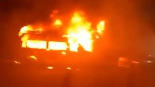 Extremist settlers set Palestinian cars and homes on after illegal outpost torn down