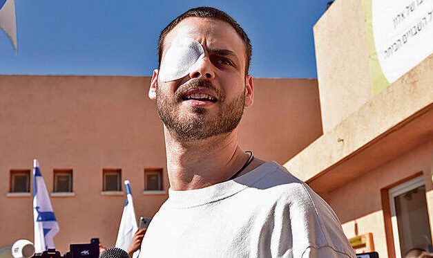 Former hostage Alon Ohel rebuilding his life in Tel Aviv with hope, music and family support