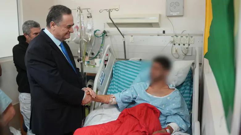 Defense Minister visits IDF soldiers wounded in Hamas ceasefire violation