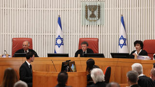 Top court swamped by petitions in escalating government showdown