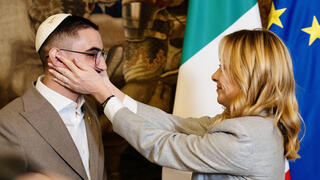 With warm embrace, Italy’s Meloni hosts ex-hostage Rom Braslavski in Rome