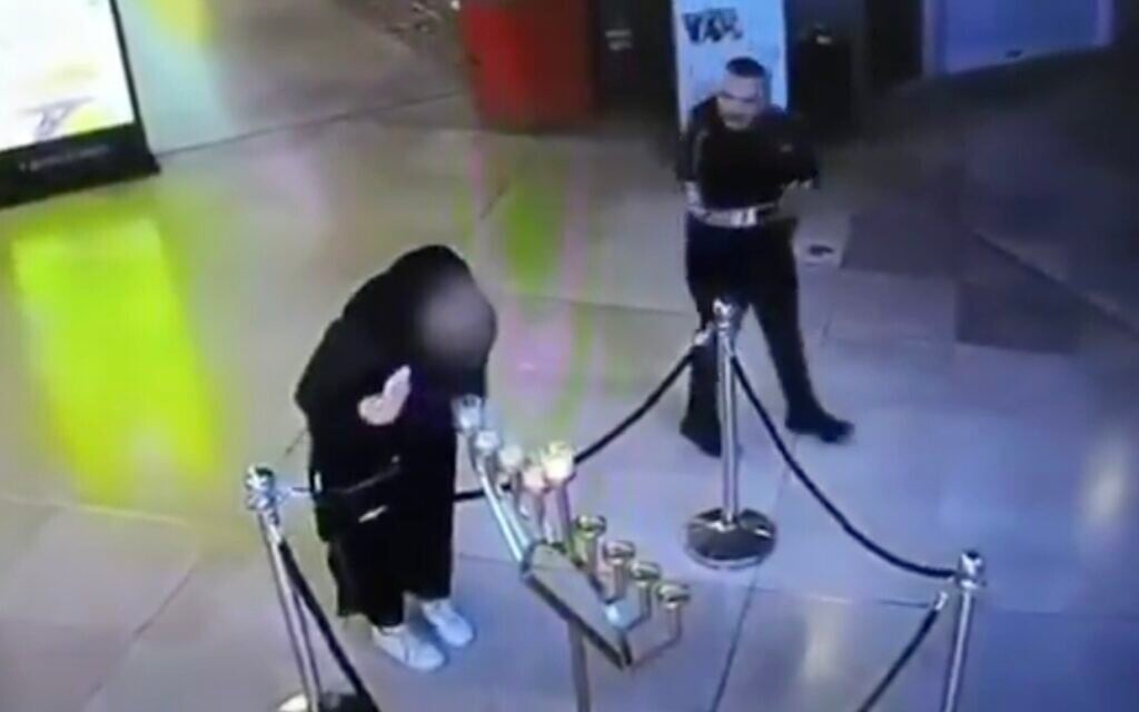 Police open investigation after woman blows out Hanukkah candles in Tel Aviv mall