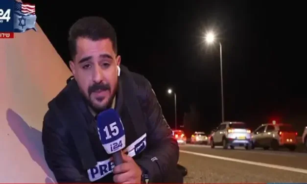 Reporting under fire: Northern correspondent takes cover on the road on-air