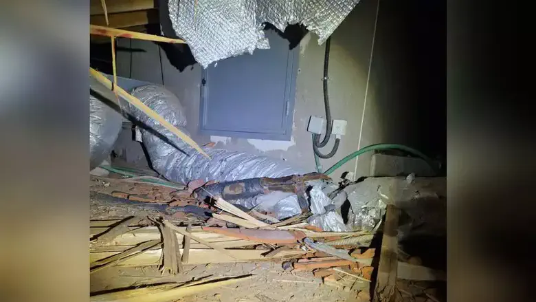 Cluster missile fragment falls in attic