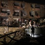 Iranian missile strikes Israeli city near main nuclear research facility.